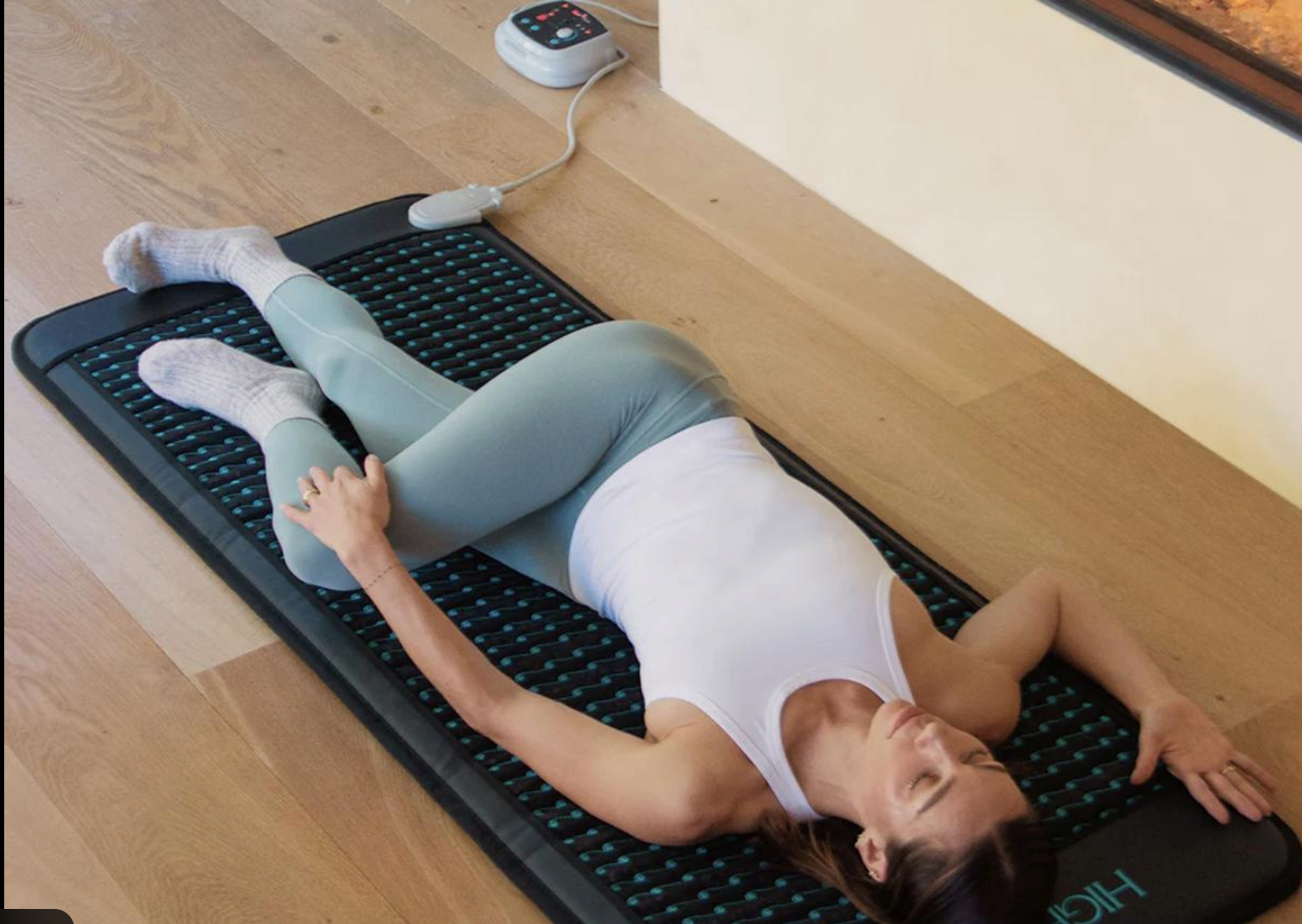 Full-body PEMF wellness mat used for recovery and relaxation