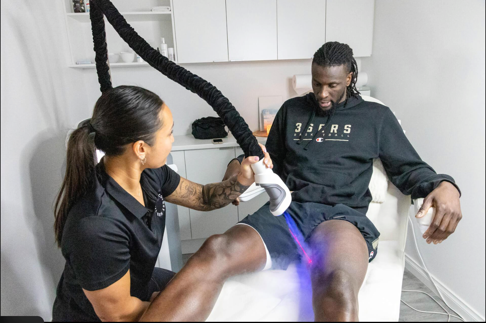 Professional cryotherapy massage treatment using controlled cooling technology for targeted muscle recovery.