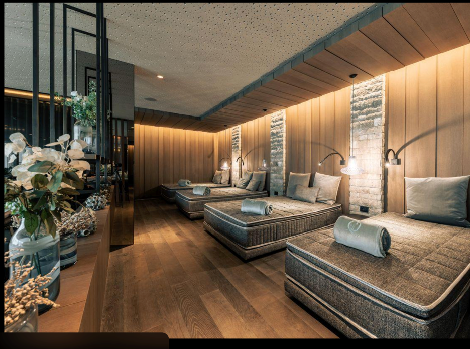 Modern wellness space with comfortable recovery loungers
